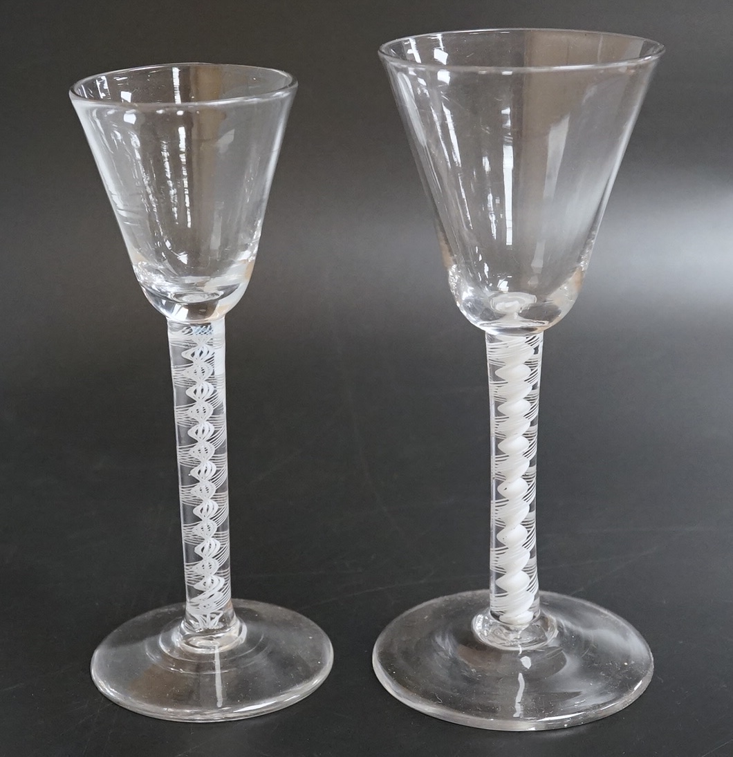 Two DSOT stem wine glasses, c.1760, with funnel shaped bowls, tallest 16.5cm high